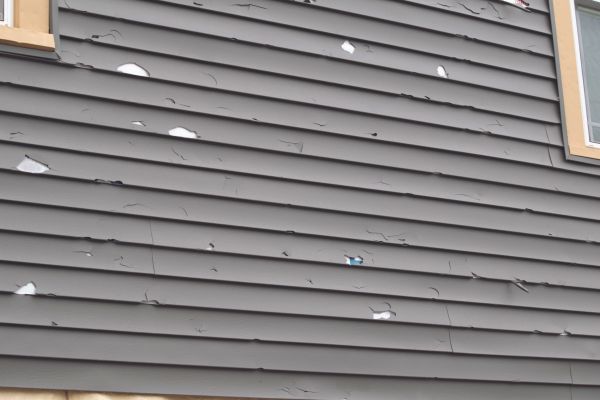 Damaged Siding Replacement in Menomonee Falls